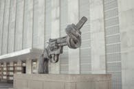 A symbolic sculpture of a knotted gun promoting non-violence at the United Nations in NYC.